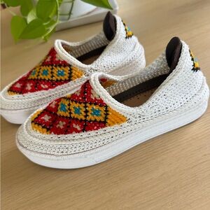 White Crochet Slip-On Shoes with Red & Yellow Embroidered Pattern